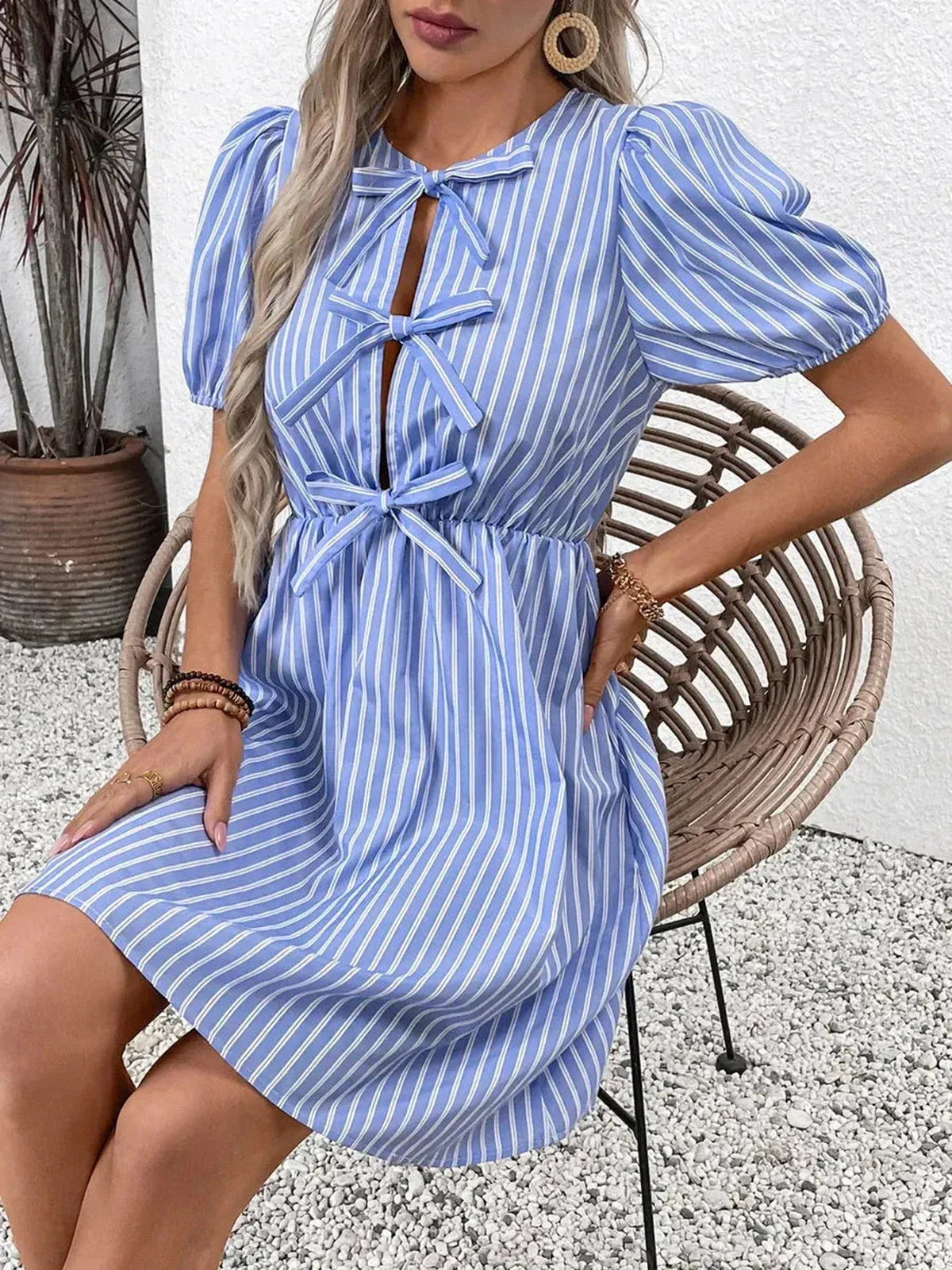 Harbor Stripe Mini Dress in blue and white stripes with puff sleeves, perfect for summer wedding guests and casual outings.