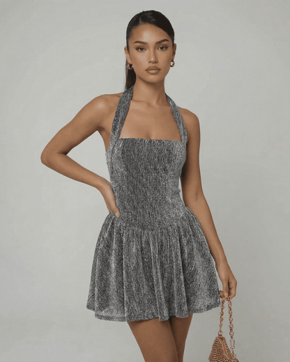 Celeste Mini Dress by Slimona, featuring a shimmering sequin texture and A-line silhouette in silver.