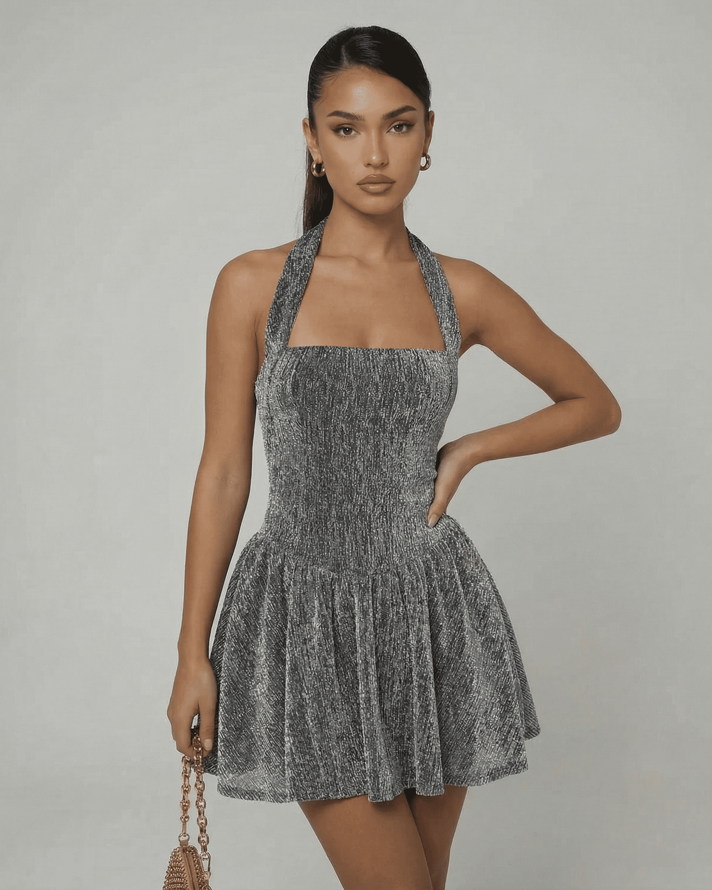 Slimona Celeste Mini Dress featuring a silver A-line silhouette with sequin texture and high waist finish.