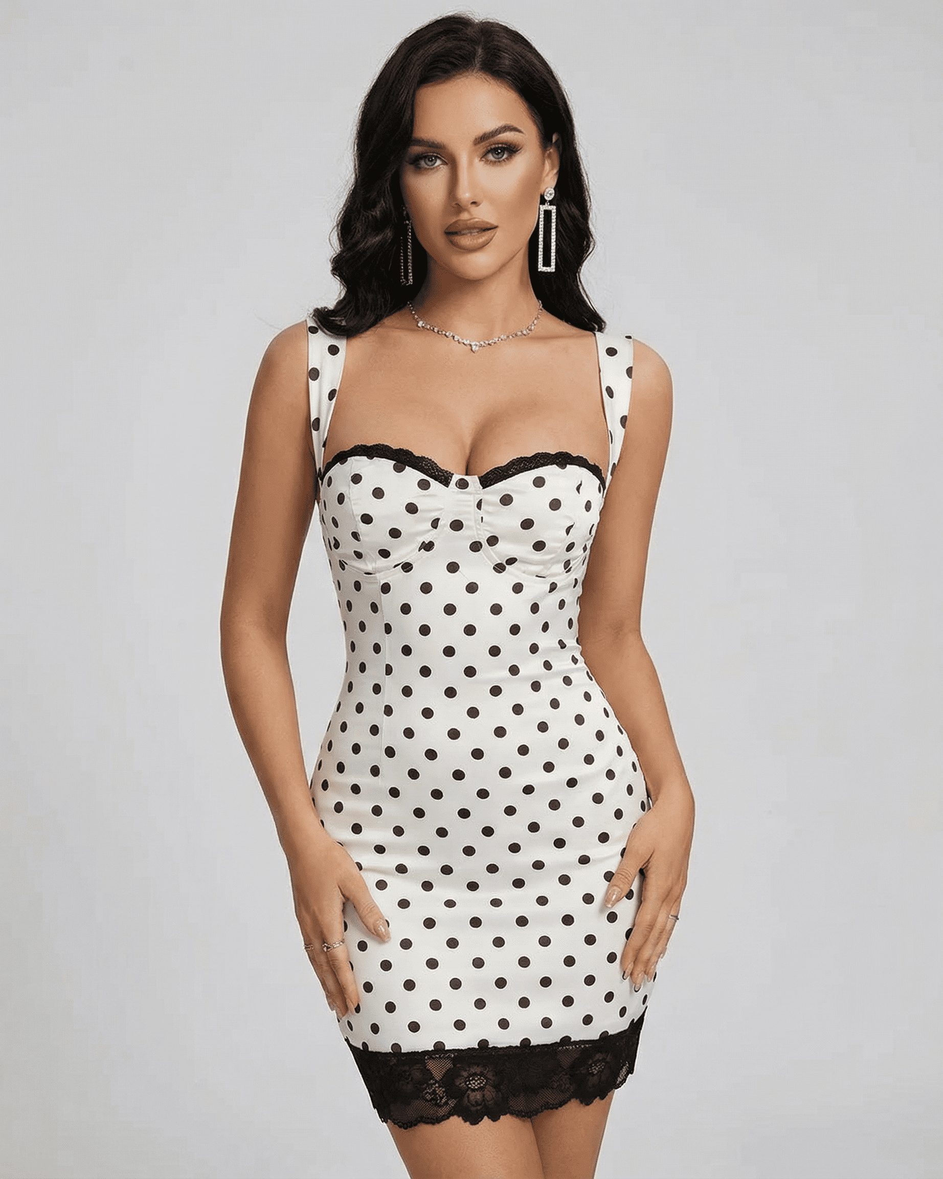 Celeste Mini Dress by Slimona featuring a polka dot design, lace trim, and a fitted silhouette.