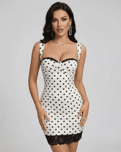 Celeste Mini Dress by Slimona featuring a polka dot design, lace trim, and a fitted silhouette.