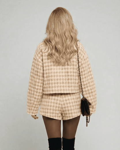 Back view of a model wearing the Milano Set by Slimona, showcasing an elegant two-piece set with tailored shorts.