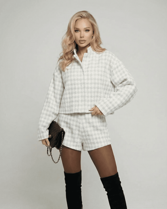 Elegant model wearing the Slimona Luna Set two-piece outfit with tailored shorts and textured long-sleeve top.