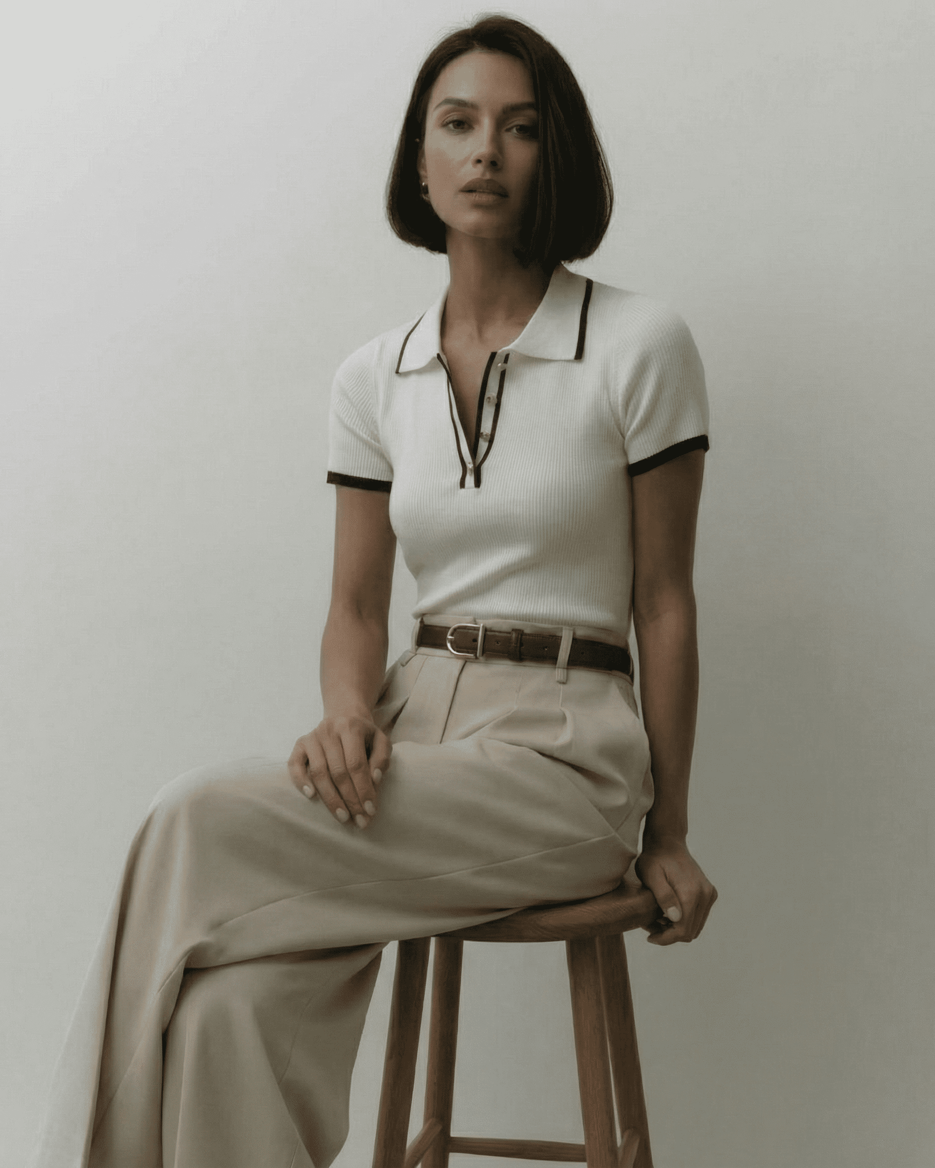 Model wearing the Siena Polo Shirt by Slimona, showcasing a refined slim fit with modern contrast detail.