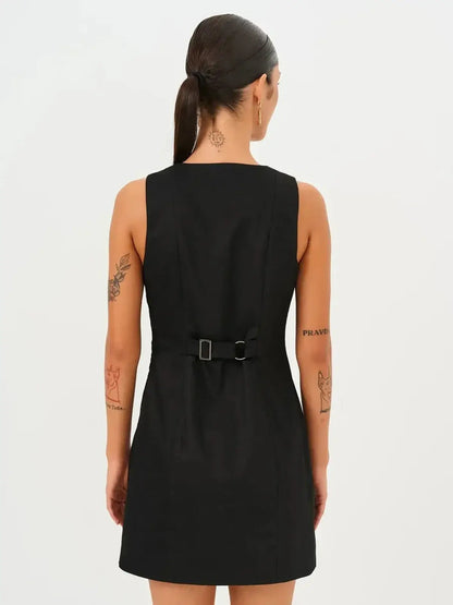 Back view of the Icon Edge Mini Dress showcasing its sleek design and structural details for women.