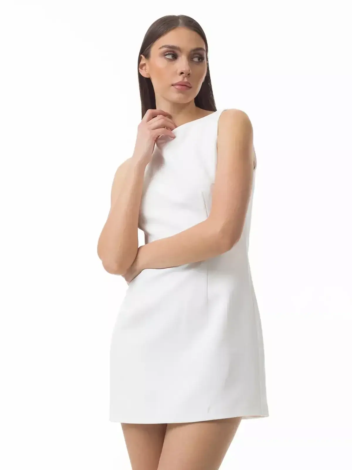 Sleek white mini dress with a boat neckline, perfect for summer events and stylish occasions.