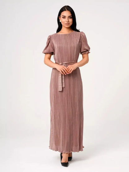Elegant Celeste Maxi Dress with pleated texture and puff sleeves, perfect for weddings or formal events.