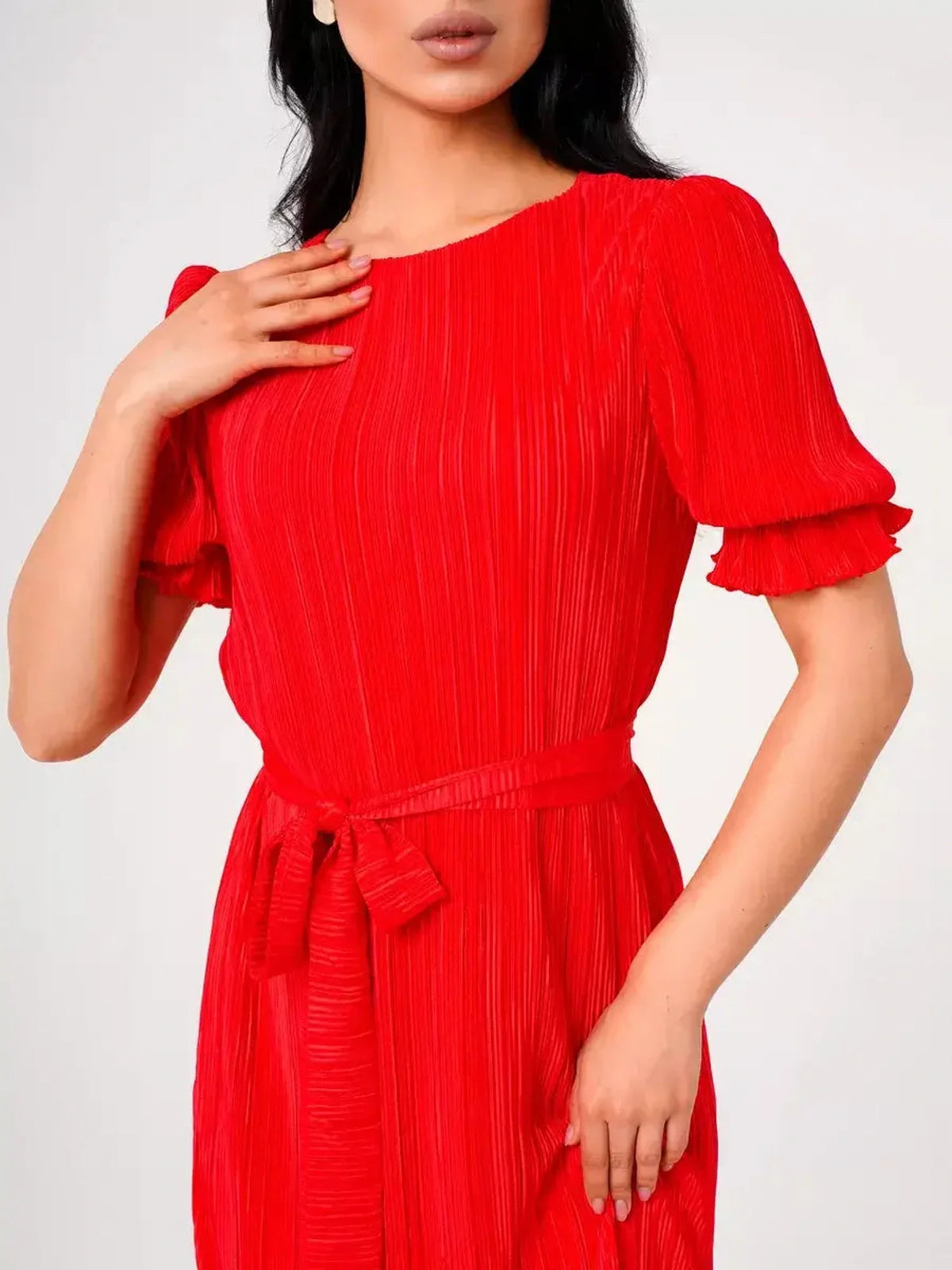 Elegant red pleated maxi dress with belted waist and puff sleeves for summer events and weddings.