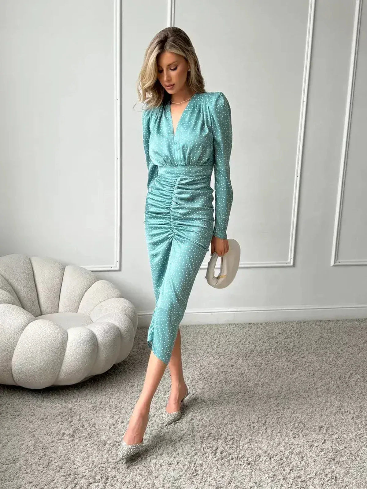 Celeste Midi Dress in pastel mint with white dots, showcasing elegant ruching and a modern vintage silhouette.