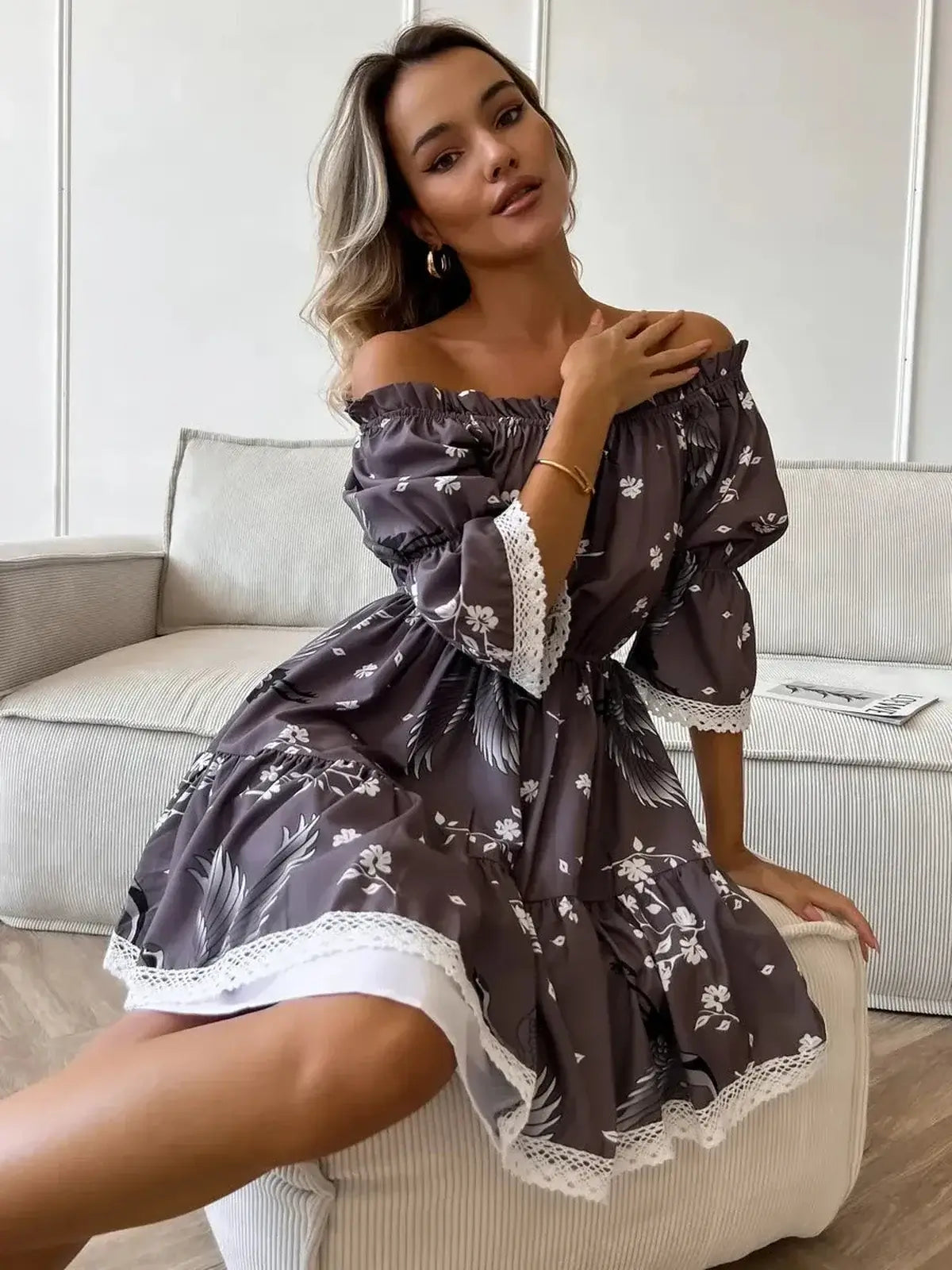 Sakura Flight off-shoulder mini dress with floral design, perfect for summer weddings and cocktail events.