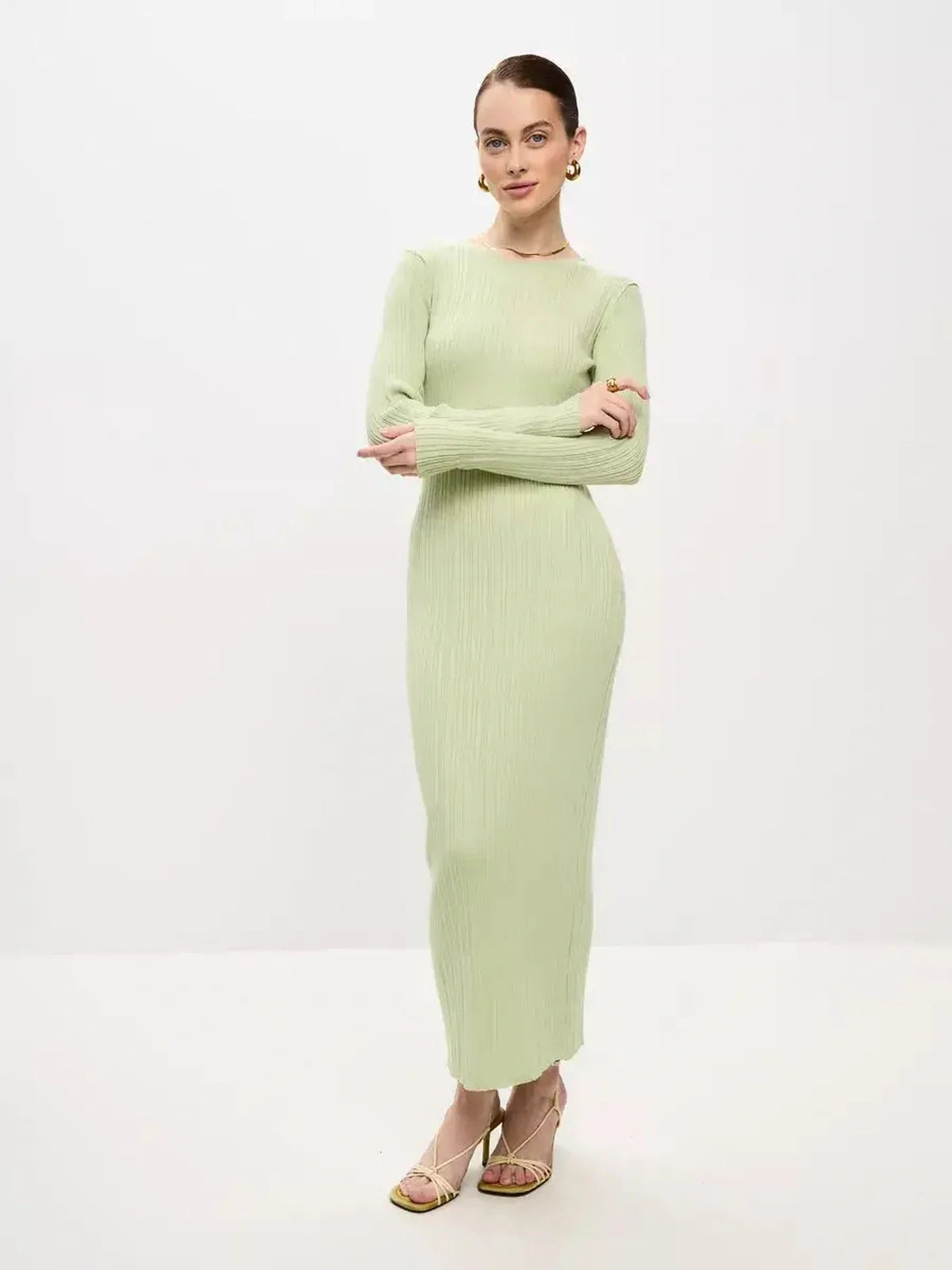 Celery Luxe Maxi Dress in light green, showcasing a ribbed fit and seamless design, ideal for weddings and special occasions.