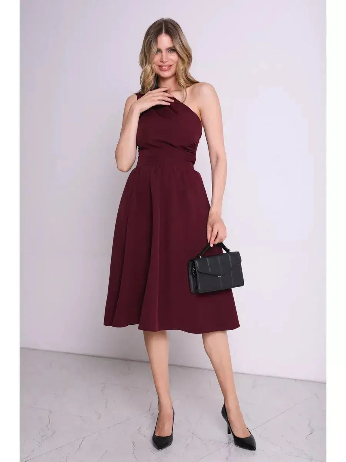 Opéra Midi Dress in rich wine hue, featuring a one-shoulder design and flared skirt, perfect for weddings and formal events.
