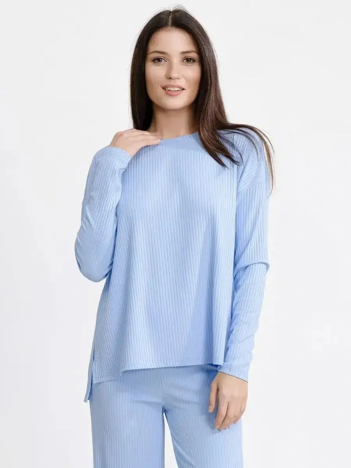 Model showcasing the Cloudline Lounge Set in soft blue ribbed knit, perfect for relaxed comfort and modern style.