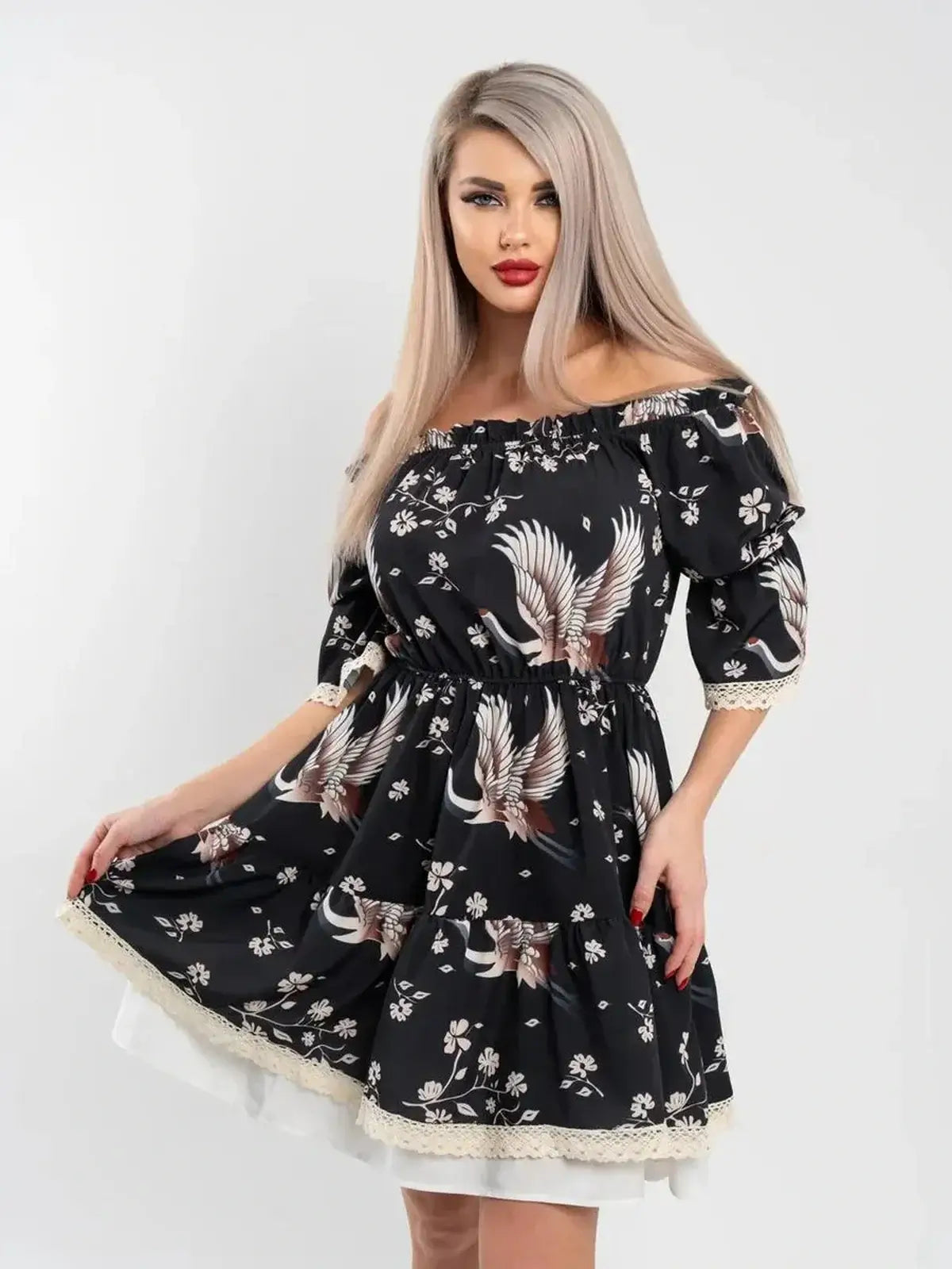 Off-shoulder Crane Bloom mini dress featuring floral print and tiered skirt, ideal for weddings and summer events.