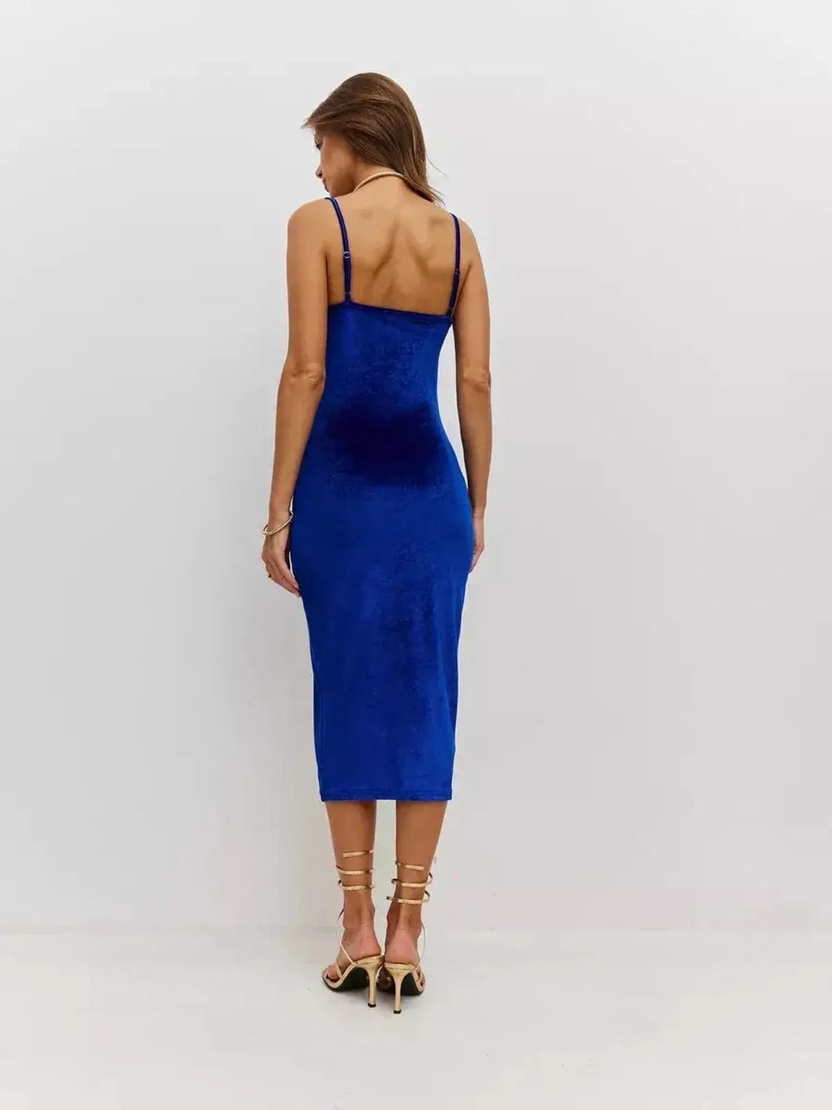 Back view of Midi Dress Royal Flame in rich sapphire blue velvet, emphasizing its sleek silhouette and elegant design.