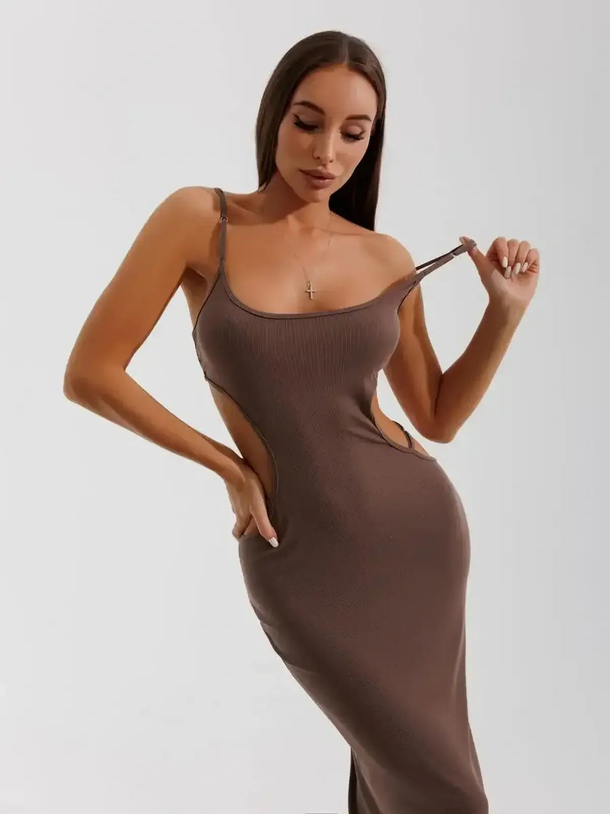 Obsidian Curve Midi Dress showcasing cut-out design and sleek silhouette, ideal for weddings, proms, or formal occasions.