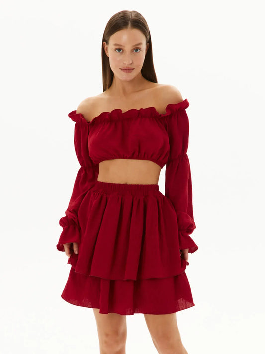 Ruffle Summer Set in red featuring an off-shoulder crop top and tiered mini skirt, perfect for summer parties.