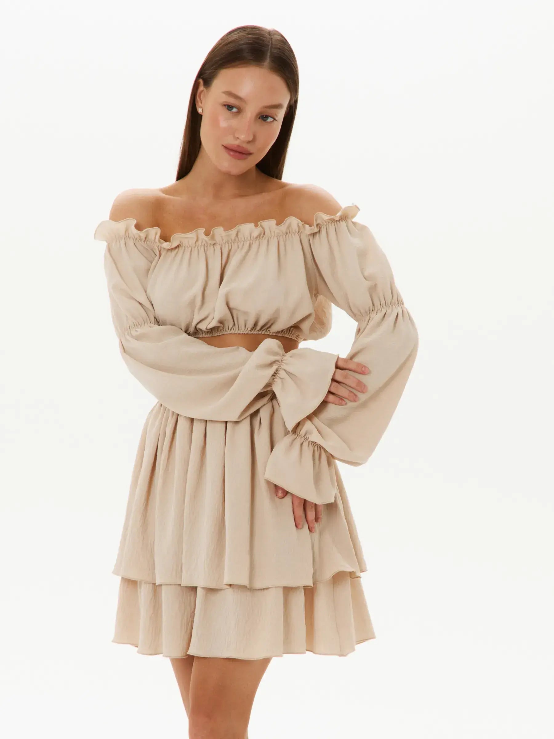 Ruffle Breeze Set featuring an off-shoulder crop top and tiered skirt in a lightweight beige fabric, perfect for summer events.
