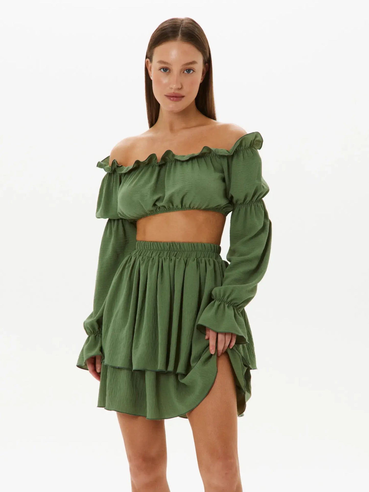 Elegant tiered ruffle set featuring off-shoulder crop top and flowy double-tiered skirt in lightweight khaki fabric.
