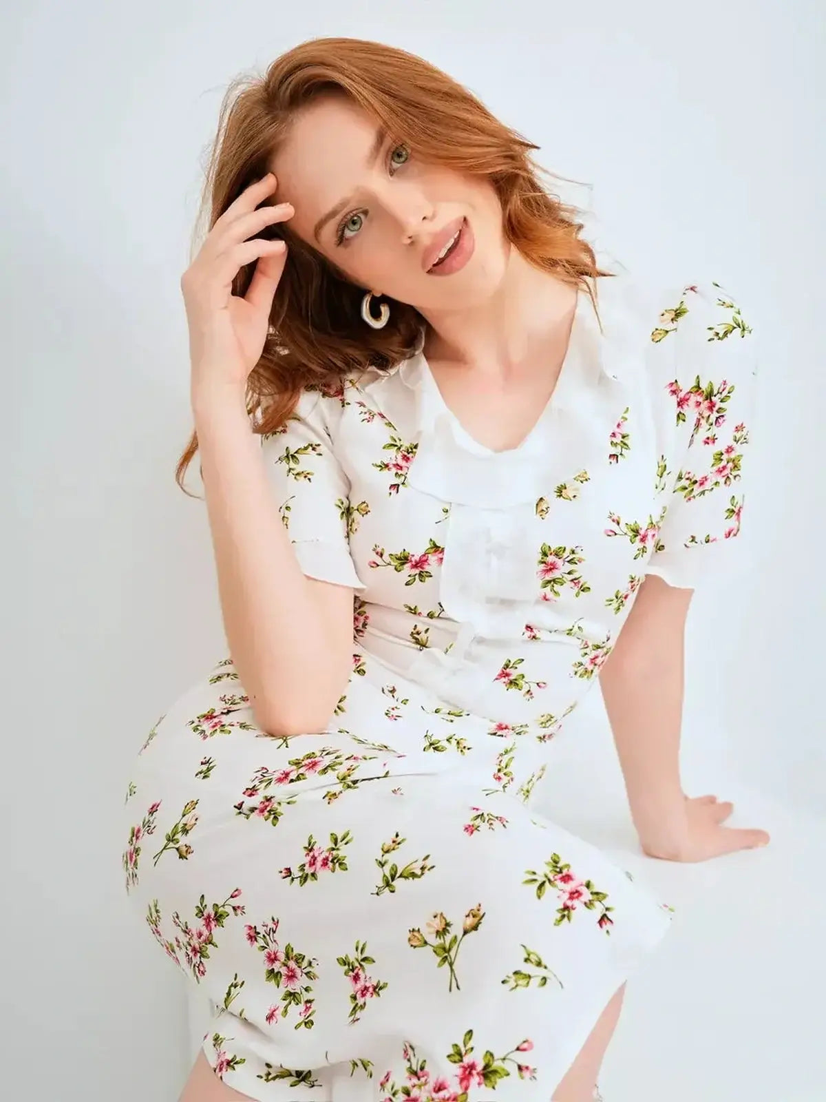 Roselle Midi Dress featuring a romantic floral print and ruffle collar, perfect for summer weddings or casual outings.