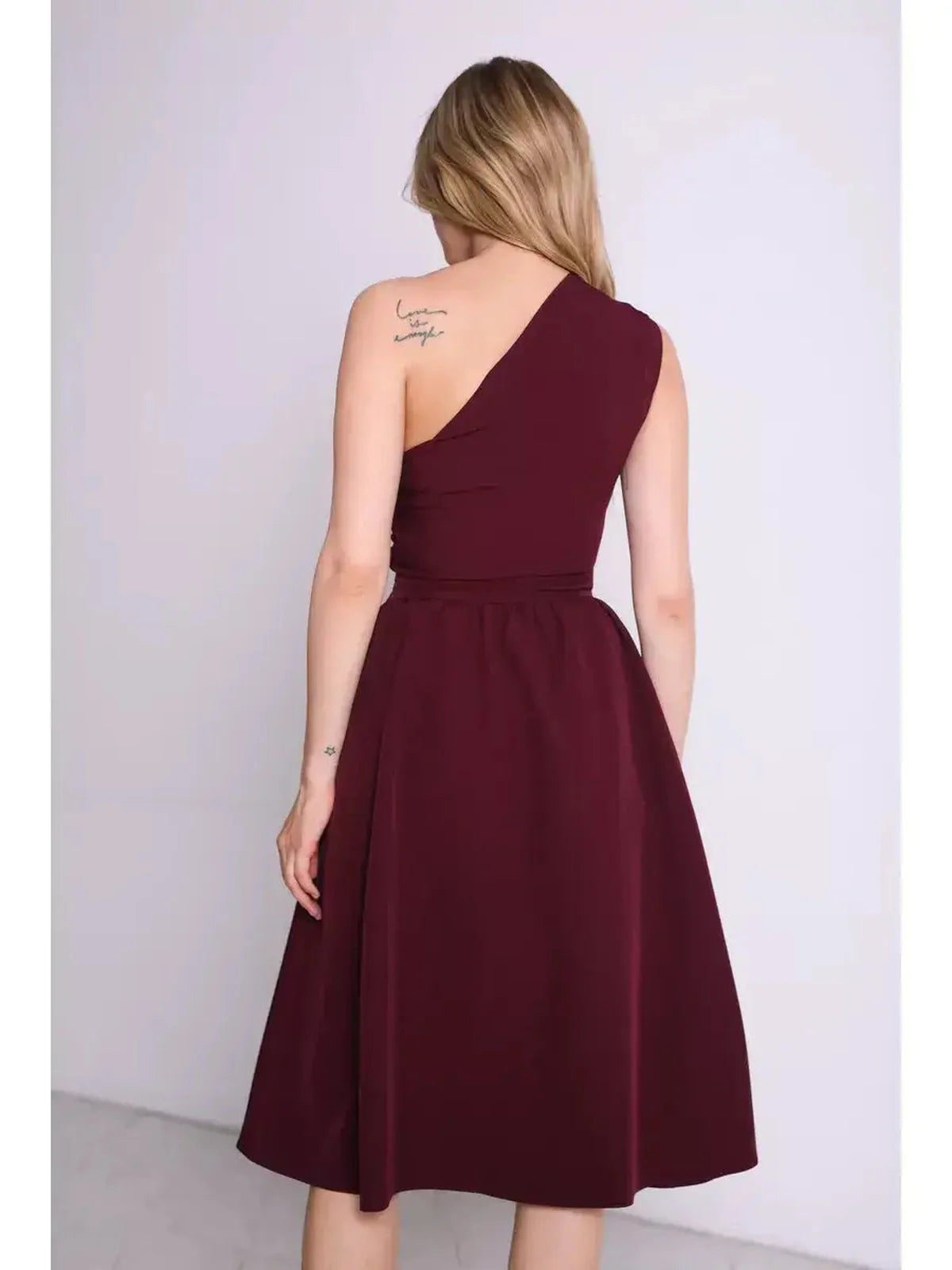One-shoulder Opéra Midi Dress in rich wine hue, showcasing elegant silhouette, perfect for formal events and evening wear.