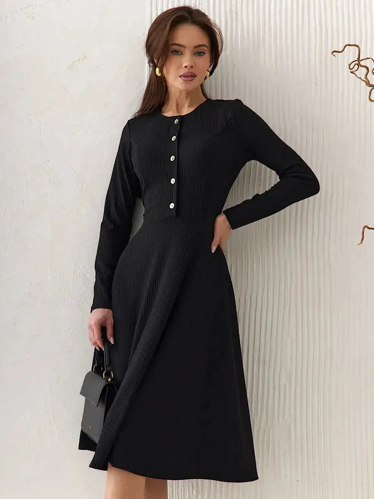 Serene Grace Midi Dress in black ribbed fabric, featuring decorative buttons, elegant tailored design for versatile styling.