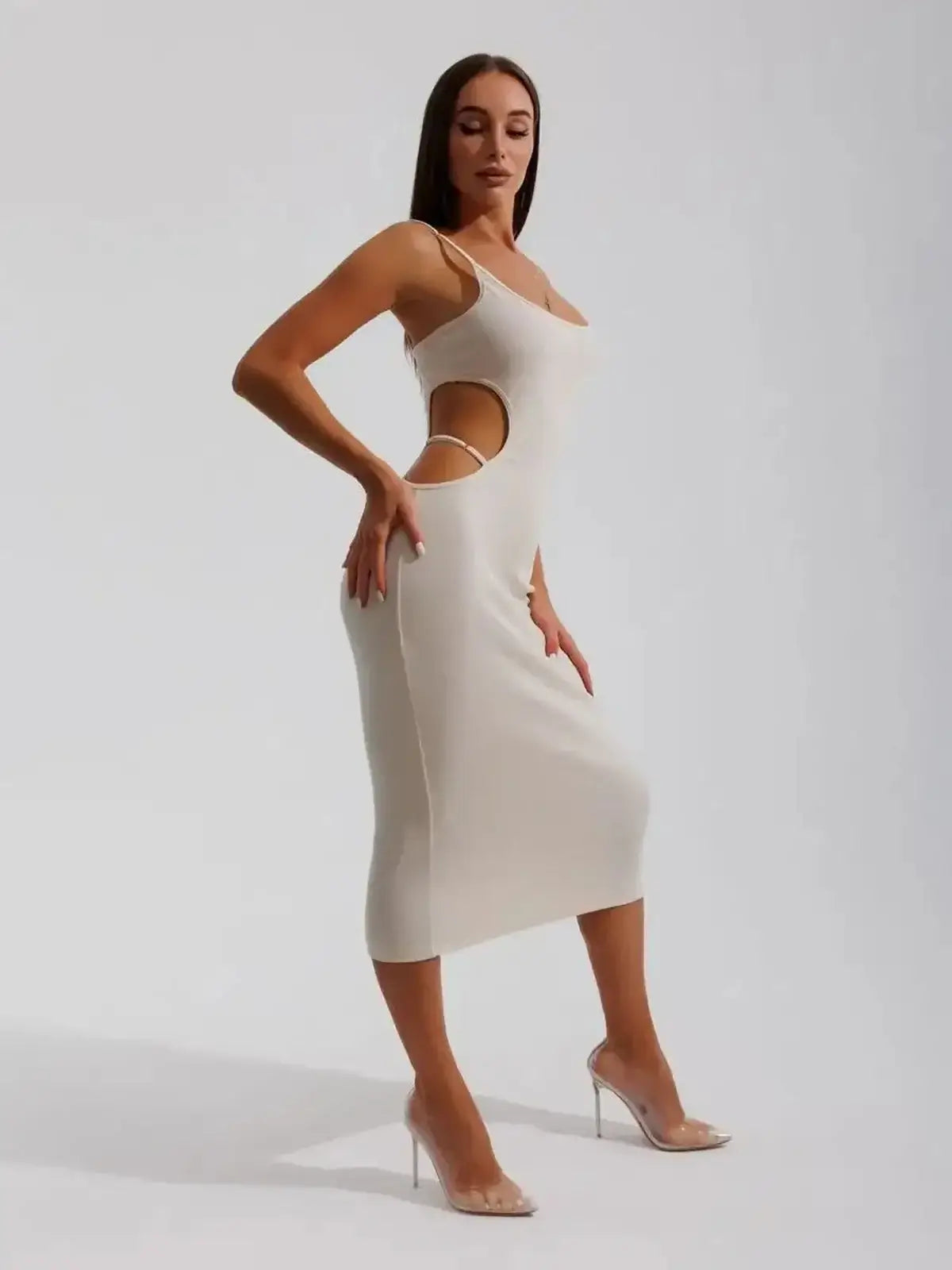 Beige midi dress Seraphine with sculpted side cutouts, ideal for weddings, proms, and summer events, showcasing elegance and style.