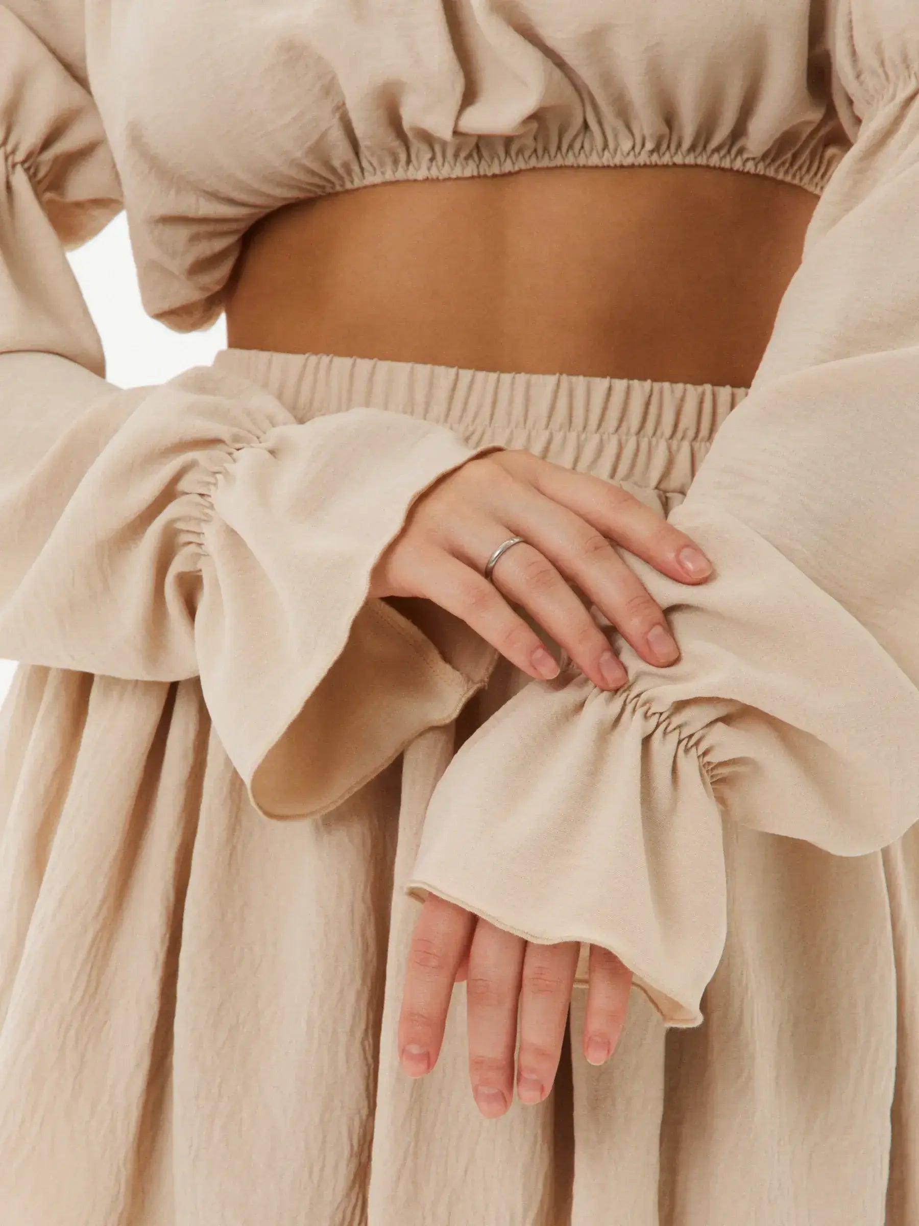 Close-up of Ruffle Breeze Set showing off-shoulder crop top and tiered skirt details, perfect for summer dresses and weddings.