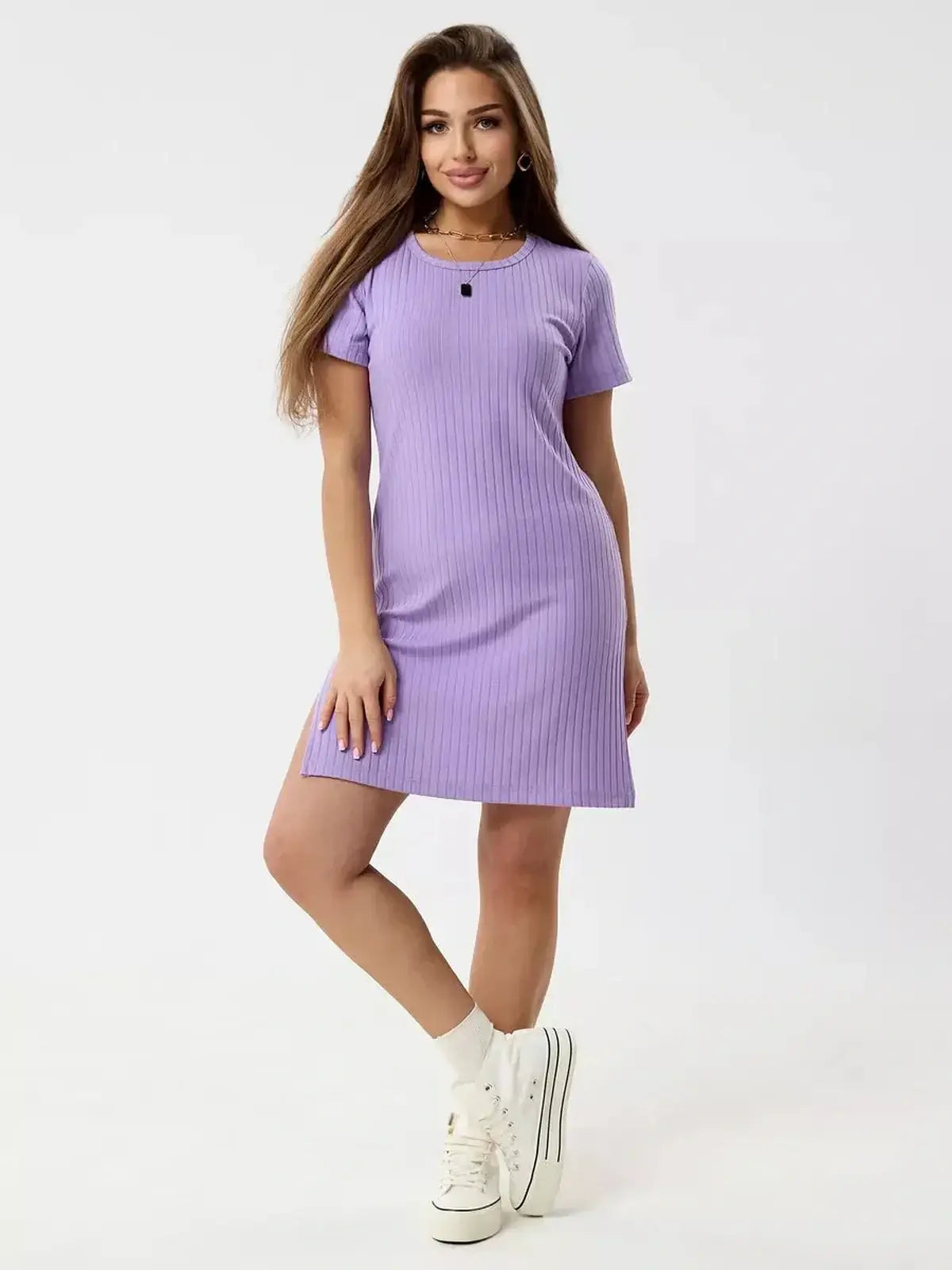 Lilac Ripple mini dress with ribbed knit texture, round neckline, and short sleeves for a stylish summer look.