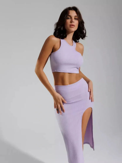 Lilac Cutout Set featuring a ribbed crop top and high-waisted skirt with a thigh-high slit, perfect for summer events.