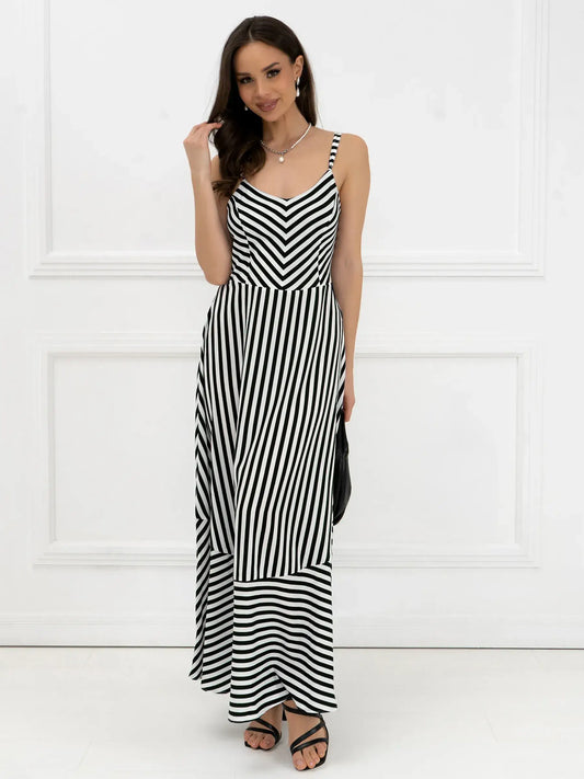 Black and white striped maxi dress, perfect for summer weddings or casual outings, showcasing elegant lines and comfort.