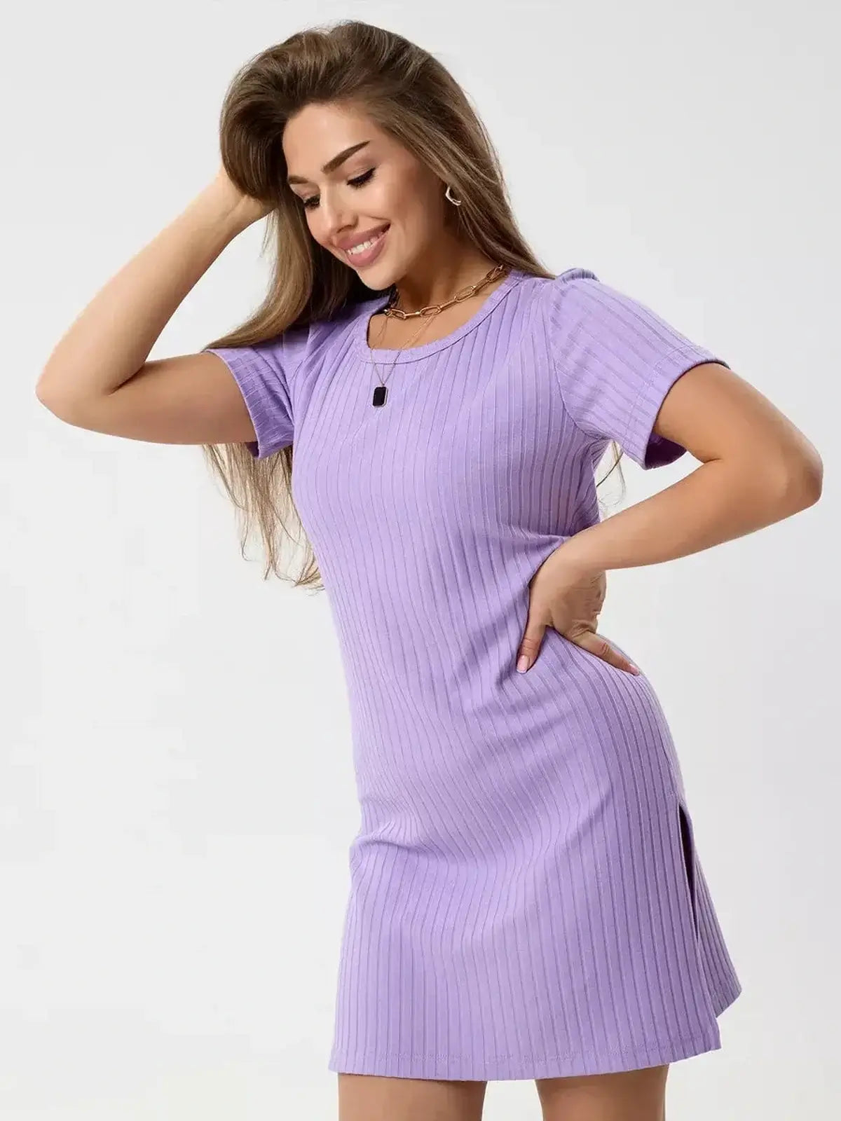 Lilac Ripple mini dress featuring a ribbed knit texture, short sleeves, and side slits, perfect for summer occasions.