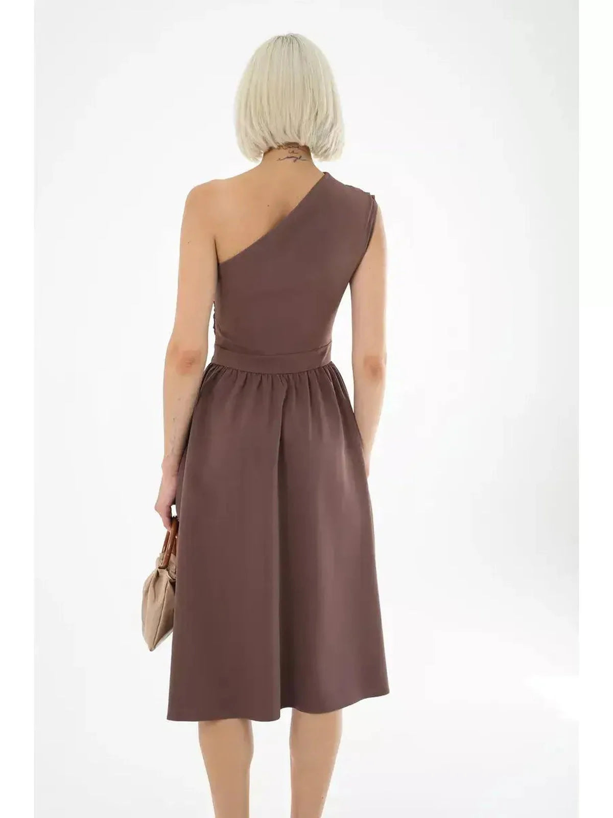 Elegant chocolate brown Solace Midi Dress featuring a one-shoulder design and gathered skirt, perfect for summer weddings.