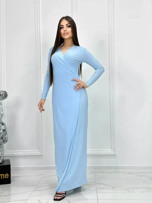 Celeste Charm Maxi Dress in light blue, featuring a wrap silhouette and long sleeves, perfect for summer weddings and formal events.