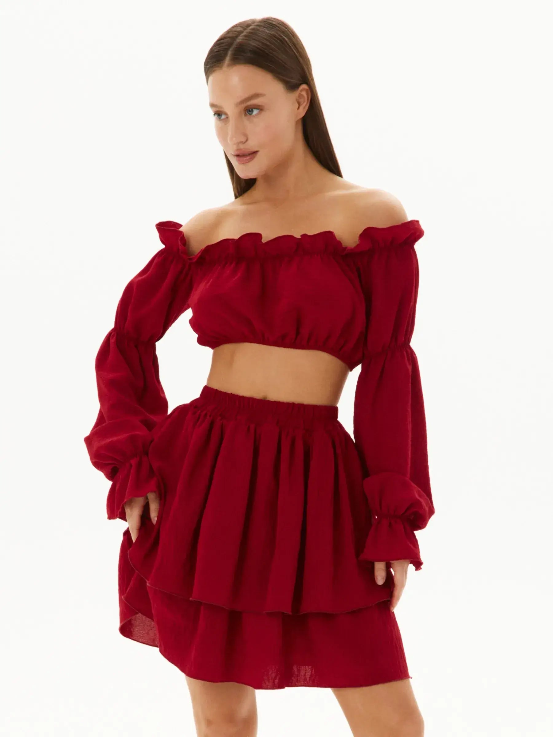 Ruffle Summer Set: Off-shoulder red crop top and tiered mini skirt, perfect for summer weddings and outdoor events.