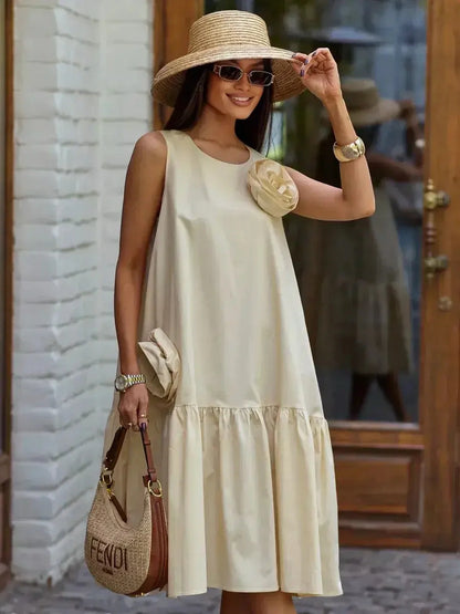 Elegant A-Line midi dress in soft champagne with rosette detail, perfect for summer events and casual outings.