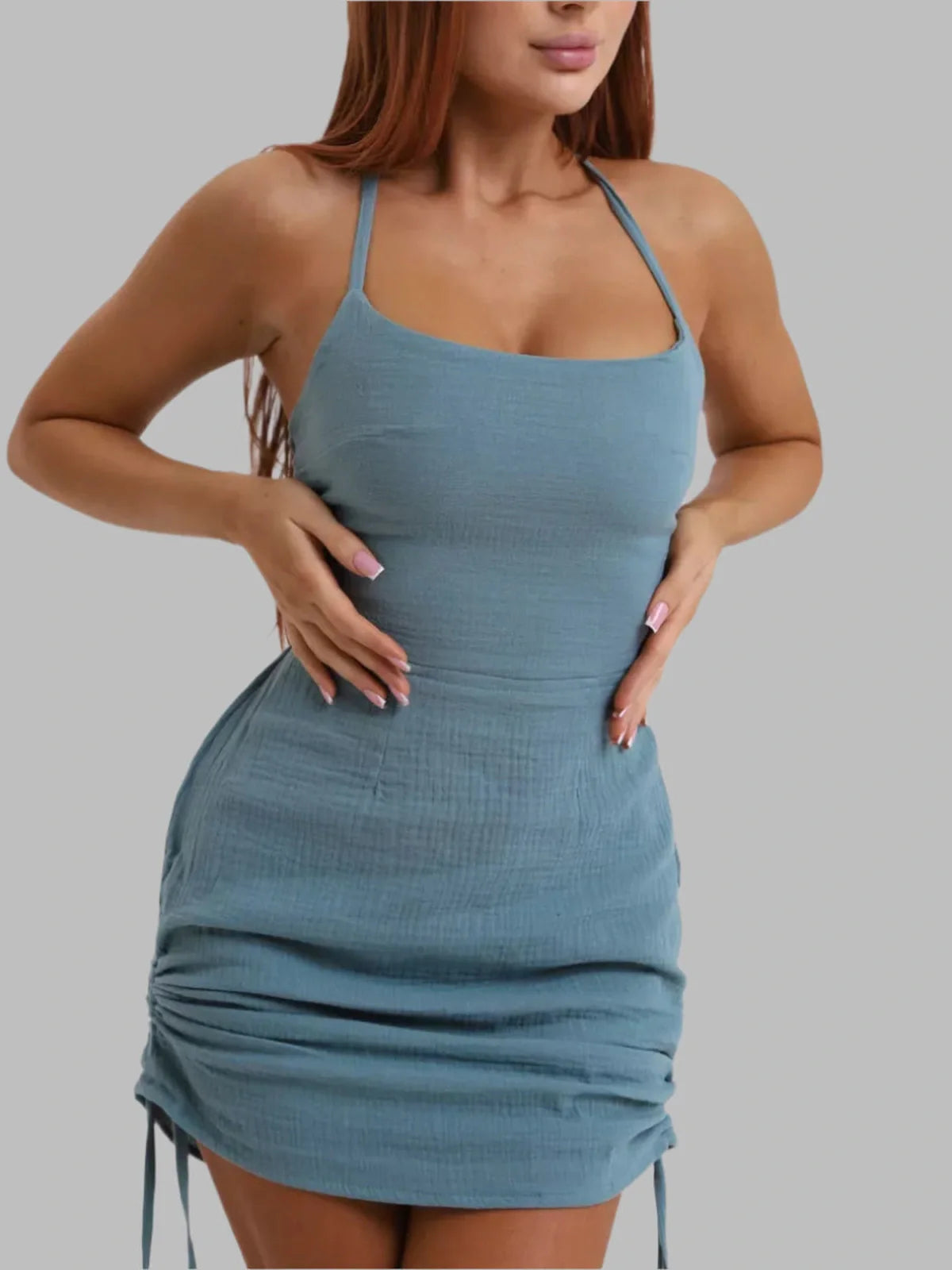 Stylish Coastal Muse mini dress in a soft blue hue, perfect for summer weddings and casual outings.