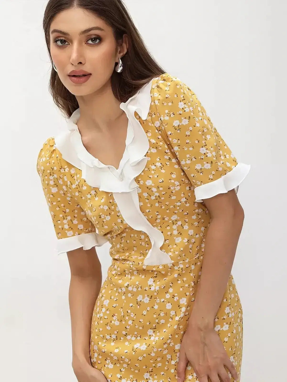 Golden Muse Midi Dress featuring yellow floral fabric, ruffled details, and a white collar, perfect for summer events.