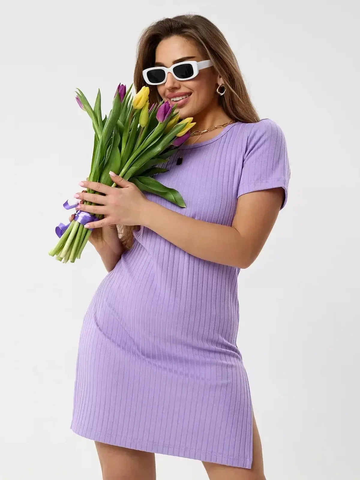 Lilac Ripple mini dress featuring a ribbed knit texture, perfect for summer, wedding guest events, and casual outings.