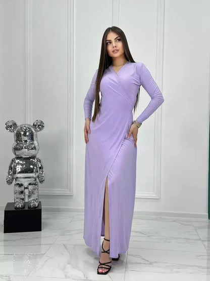 Lilac Mirage Maxi Dress featuring a wrap design, long sleeves, and a high side slit for elegant summer occasions.