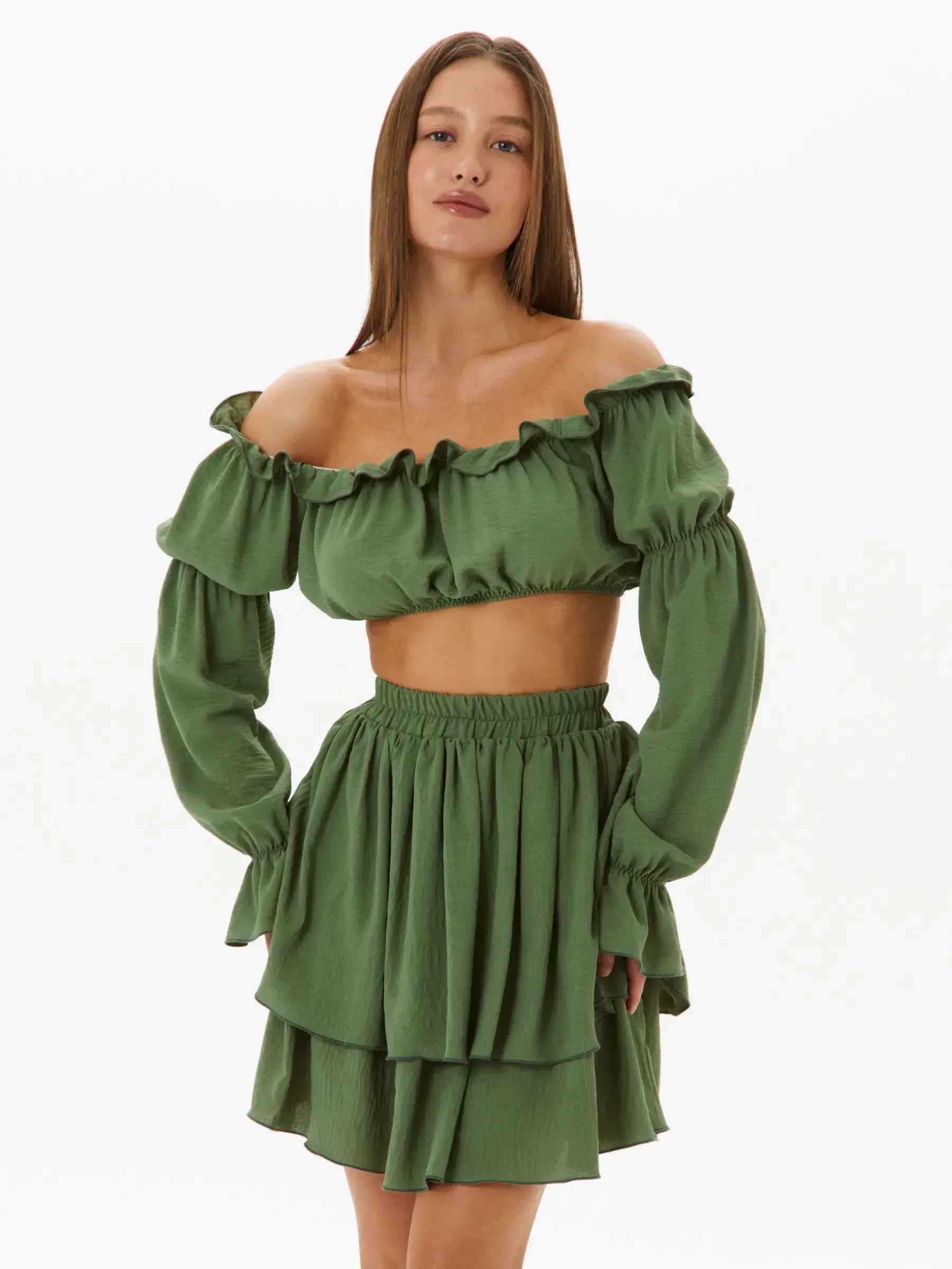Elegant khaki tiered ruffle set featuring off-shoulder crop top and flowy mini skirt, perfect for summer or weddings.