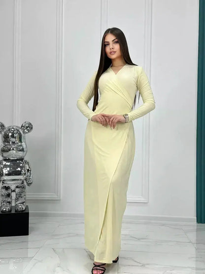 Elegant Celeste Wrap Maxi Dress in luminous buttercream, ideal for weddings, proms, and formal occasions.