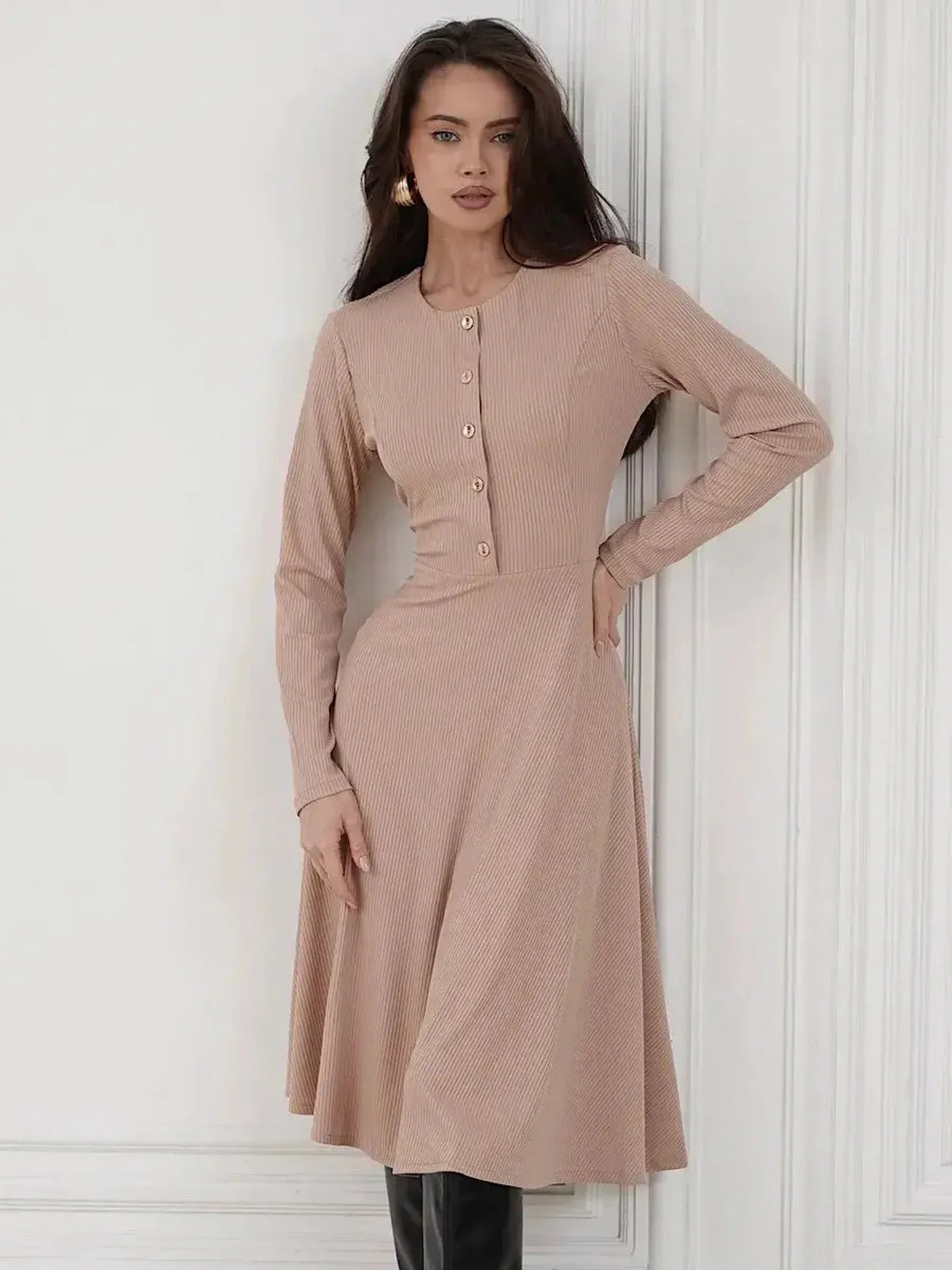 Sculpted Ease Midi Dress in beige, ribbed knit with button accents, perfect for elegant casual or formal occasions.