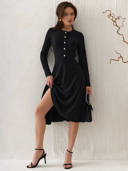 Serene Grace Midi Dress in black with decorative buttons, ideal for formal or cocktail occasions, showcasing elegance and sophistication.