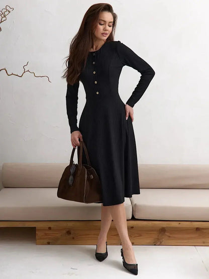 Serene Grace Midi Dress in black ribbed fabric, featuring a tailored bodice and flared skirt, perfect for formal occasions.