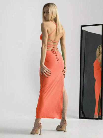 Stylish Maxi Dress Sunset Bloom in coral with open back and high slit, perfect for summer events and special occasions.