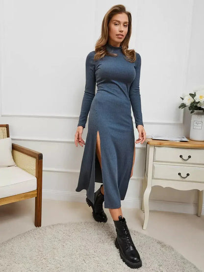 Model wearing a sleek Midnight Slit Midi Dress with bold side slits, styled for a sophisticated look.