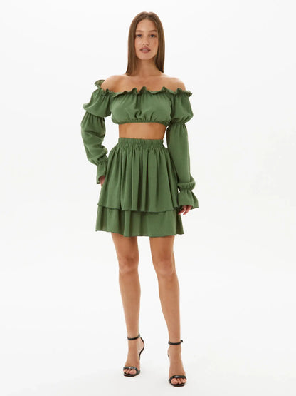 Elegant Tiered Ruffle Set featuring an off-shoulder crop top and flowy skirt, perfect for summer weddings or events.