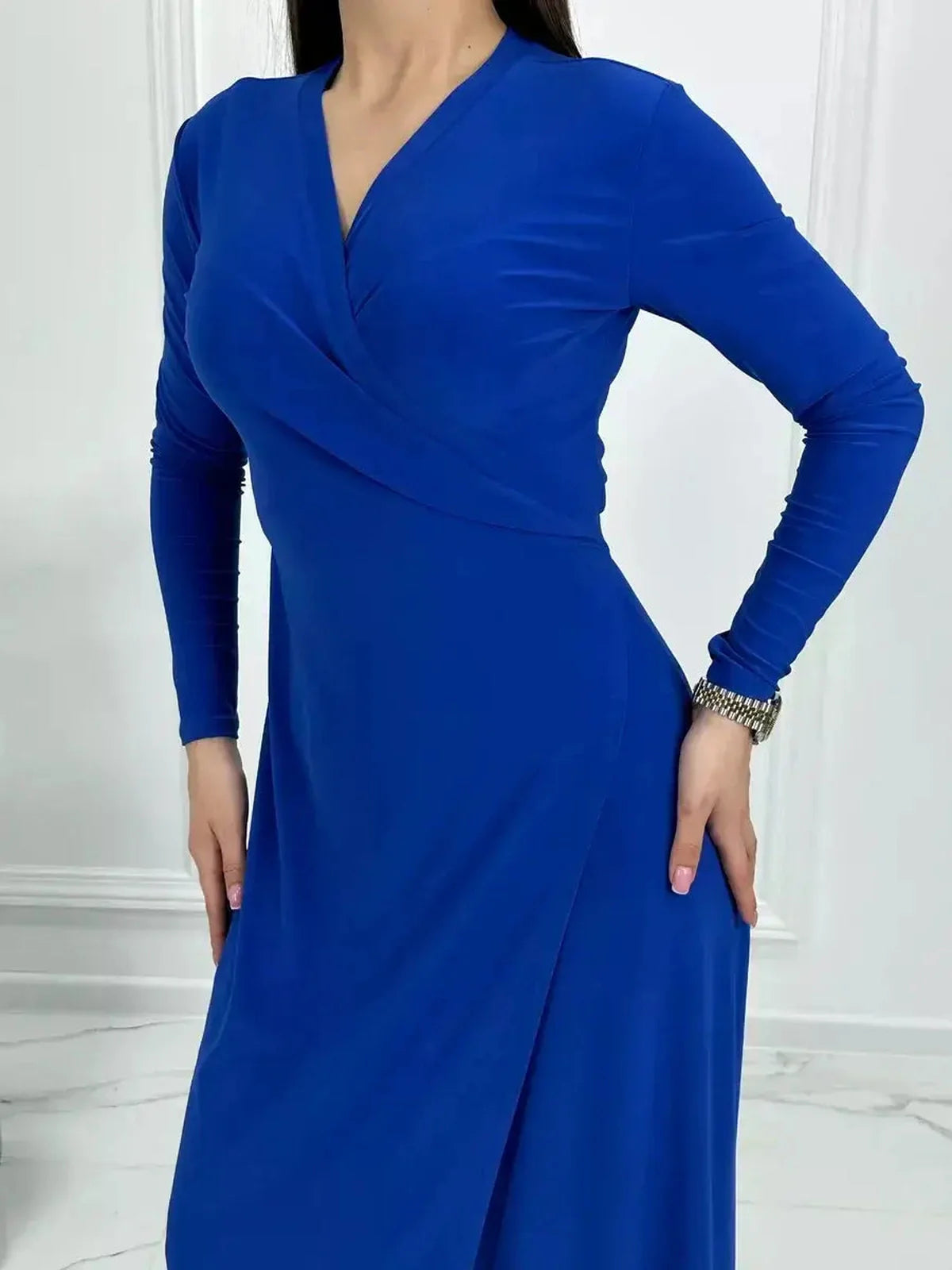 Sculptura Maxi Dress in royal blue with wrap-style bodice and long sleeves, ideal for formal events and weddings.