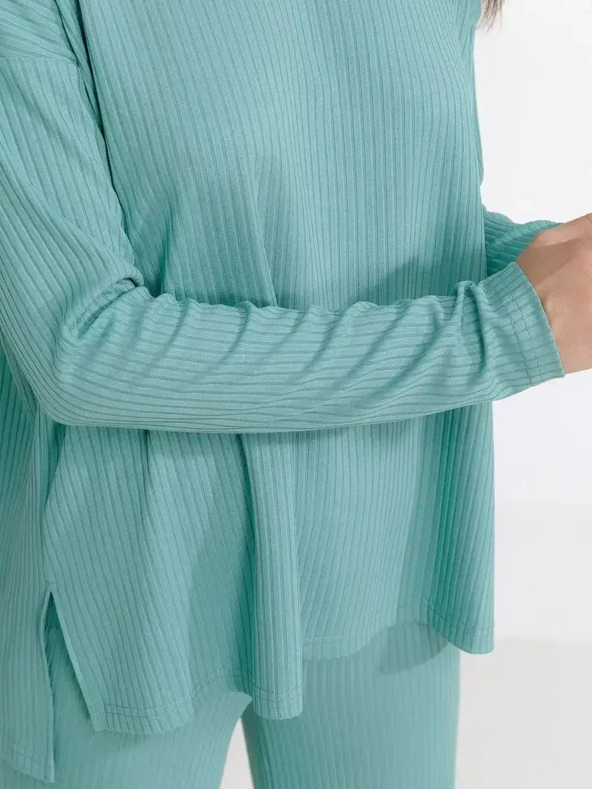 Close-up of a soft ribbed mint lounge set top featuring relaxed fit and stylish design for comfortable women's loungewear.